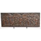 African tribal carved wooden panel decorated with slaves in procession, carved from a single