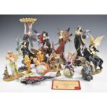 A collection of mostly fantasy figures including two by Amy Brown, tallest 28cm
