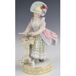 Meissen figurine playing cards / patience impressed marks '127' and 'F64', height 15cm