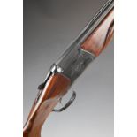 Baikal IJ-27E-1C 12 bore over and under shotgun with engraved lock, chequered semi-pistol grip and