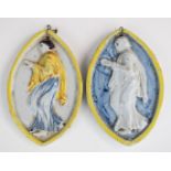 Pair of 19thC oval relief moulded plaques with figural decoration, in the style of Della Robbia,