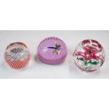 Three Scottish glass paperweights comprising William Manson Paul Ysart Tribute with an adventurine