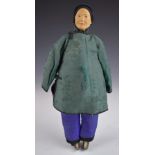 Chinese 'Door of Hope' doll wearing teal green silk jacket, purple under trousers and velvet