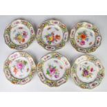 Set of six Dresden reticulated and relief moulded cabinet plates with flower decoration, diameter