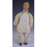 Chinese 'Door of Hope' doll wearing a pale blue (faded) trousers and jacket, with carved bun