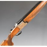 Winchester Model 91 12 bore over and under ejector shotgun with engraved lock, trigger guard,