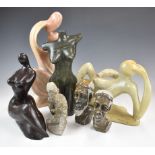 Collection of contemporary African carved soapstone tribal figures, tallest 32cm