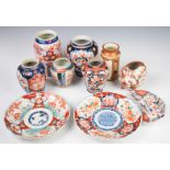 A collection of Japanese Imari and Kutani ceramics including vases, dishes, egg shaped vase etc,
