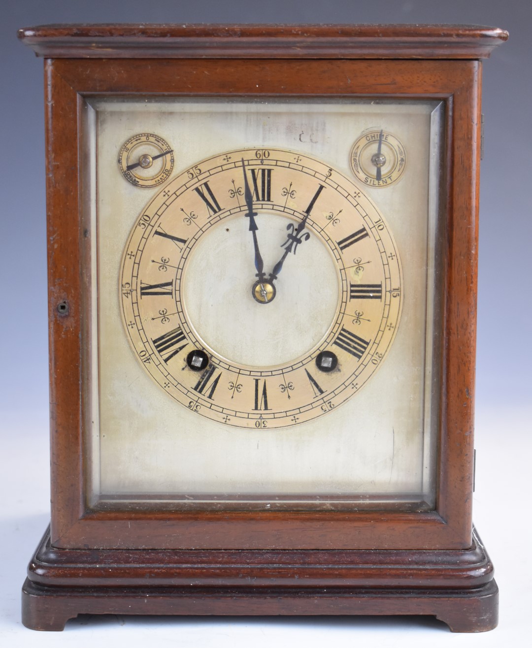 Early 20thC four glass mantel or bracket clock, with bevelled glass, the silvered dial also having