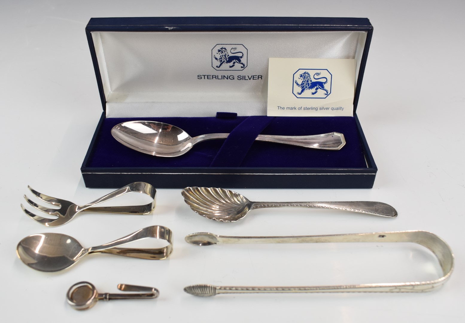 Georgian and later hallmarked silver cutlery including a pair of bright cut sugar nips, baby's spoon