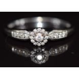 A 9ct white gold ring set with diamonds, 2g, size P