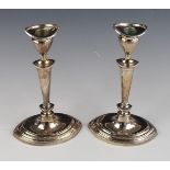 Mappin & Webb Elizabeth II pair of hallmarked silver candlesticks, Sheffield 1958/9, height 24cm