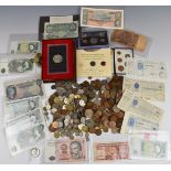 A collection of overseas coinage including presentation packs, a certified Roman example, some UK