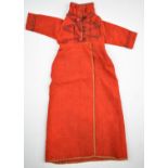 18th / 19thC woollen doll's dress with embroidered decoration and cloth buttons, length 45cm