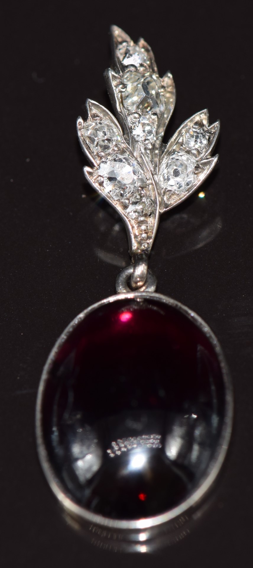 Victorian 9ct gold pendant set with a garnet cabochon and old cut diamonds in a foliate setting, the - Image 3 of 3