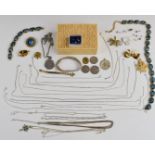 A collection of jewellery including silver chains, necklaces, three 50p coins, silver earrings,