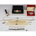 A collection of costume jewellery including Certina and Smiths watches, silver shamrock pendant,