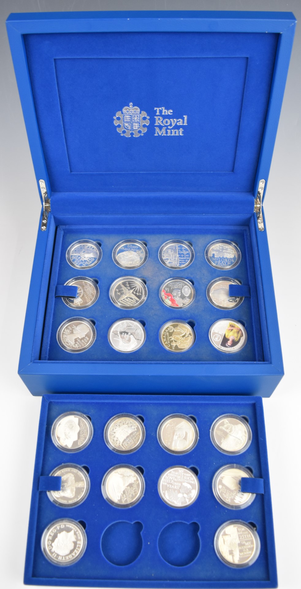 Twenty two Royal Mint silver proof Queen Elizabeth II crowns, in fitted case, no certificate