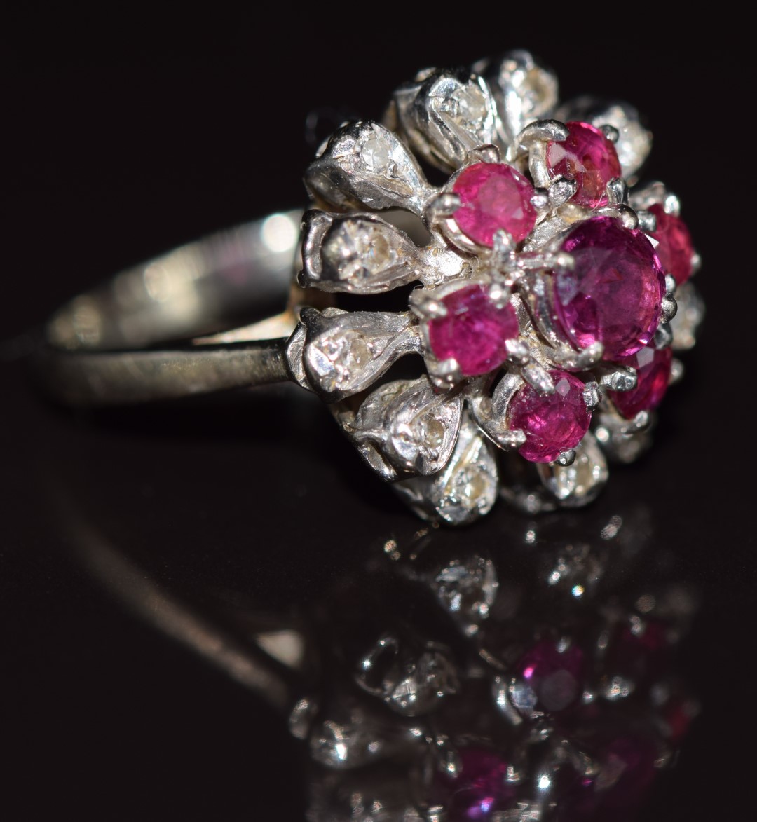 An 18ct white gold ring set with rubies and diamonds in a floral cluster, 5.1g, size I - Image 2 of 2