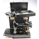 Singer 221K1 featherweight sewing machine, in original carry case with instructions, accessories,