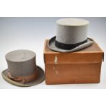 Two vintage grey top hats, one Moss Bros 20 x 16.5cm, the other Scott & Co. 20 x 16cm, together with