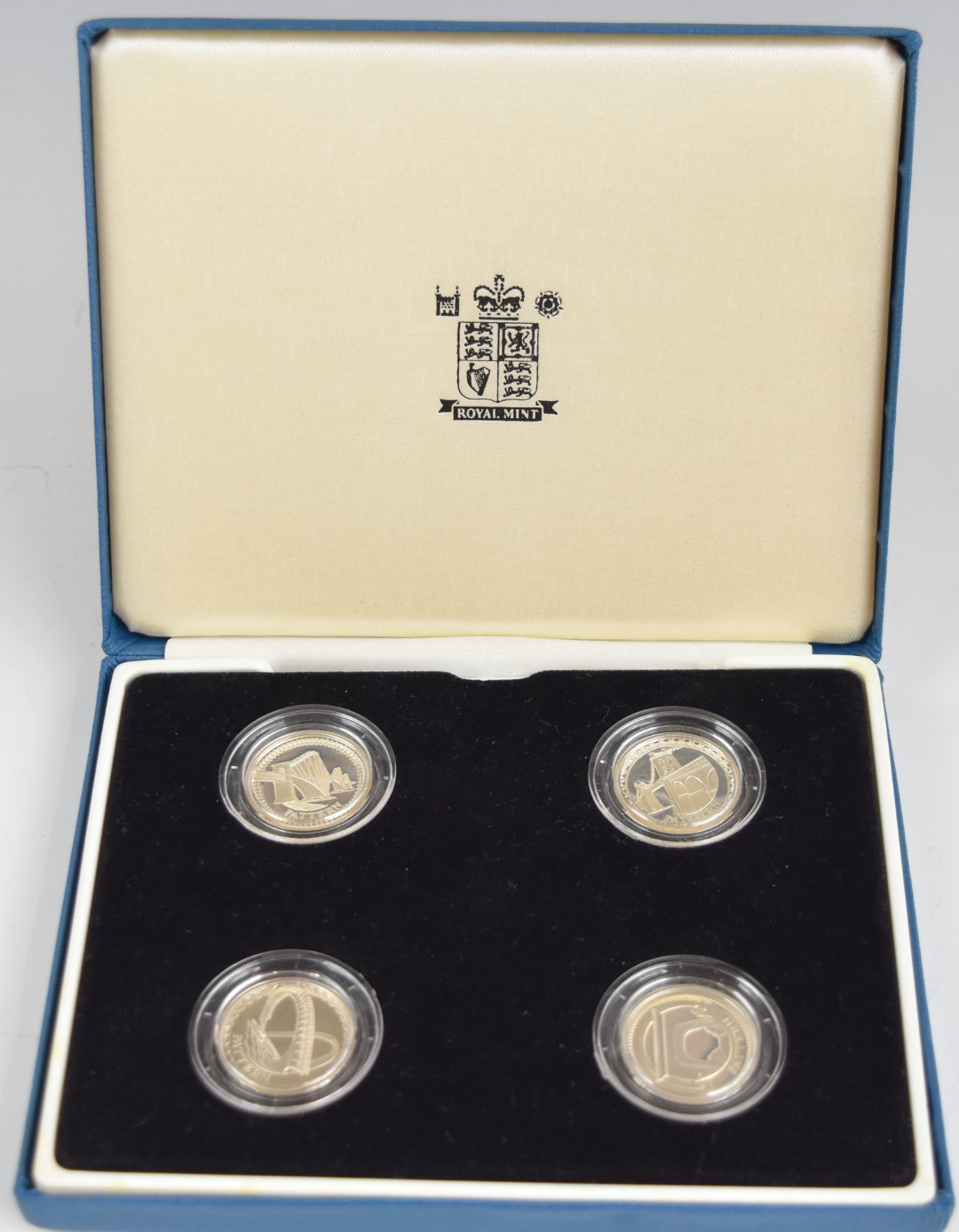 Royal Mint cased set of four silver proof 2003 £1 coins featuring bridges