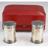 Cased pair of Victorian hallmarked silver peppers, London 1899, maker Horace Woodward & Co Ltd,