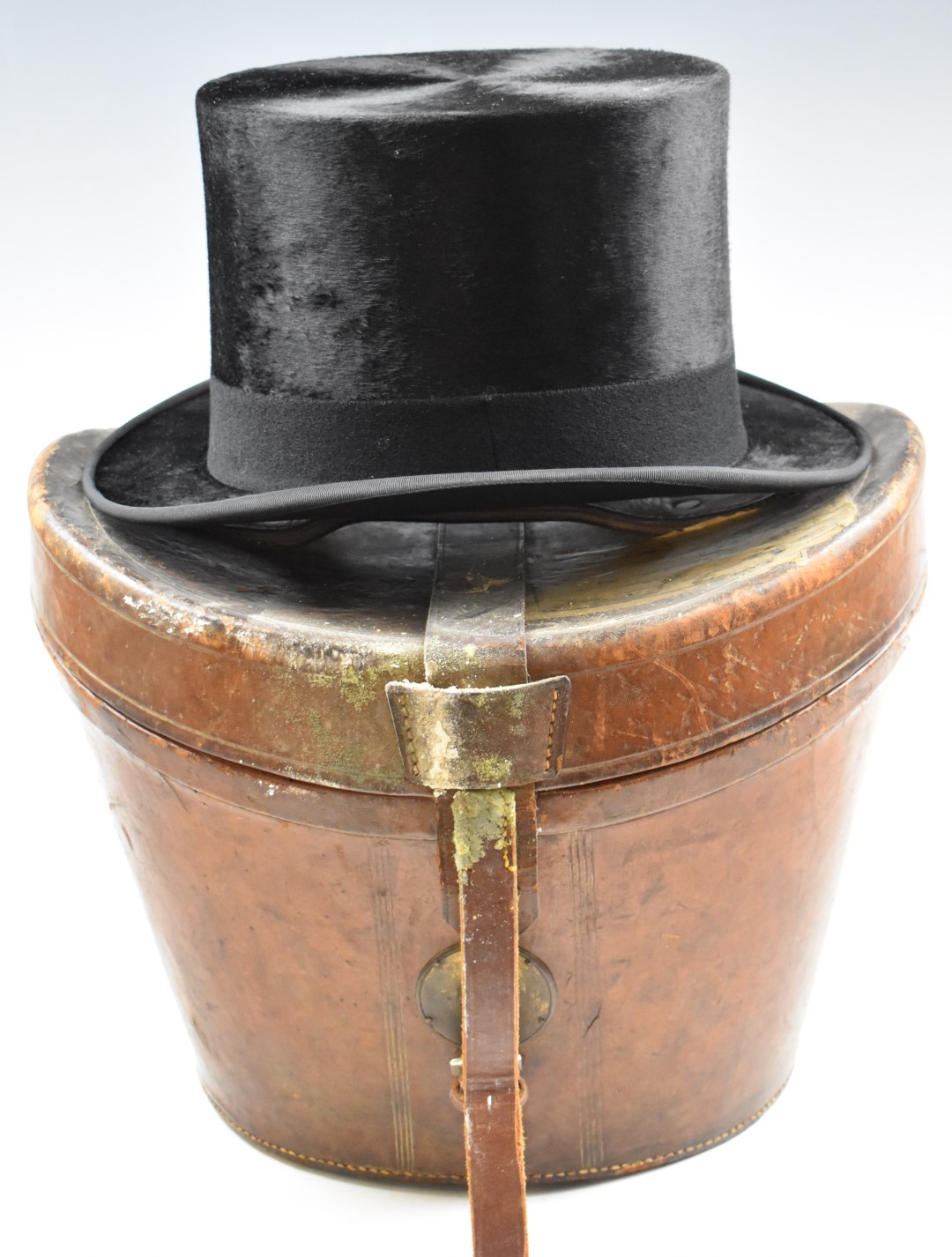Christys', London black top hat, 20 x 16.5cm, in vintage leather case with G W labels