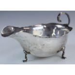 Walker & Hall George VI hallmarked silver sauce boat raised on three feet, Sheffield 1939, length