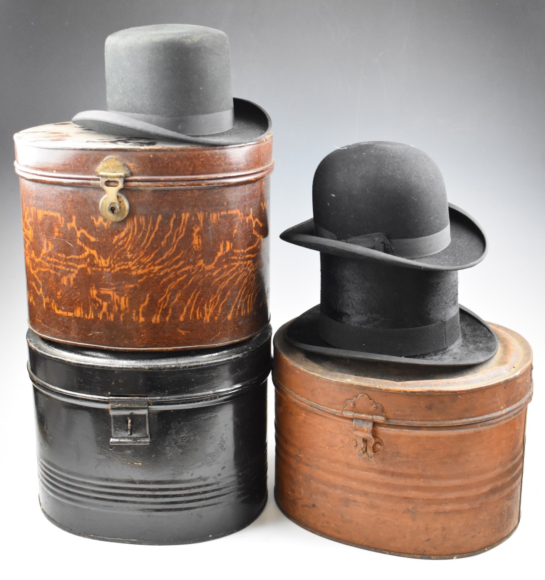 Three tin hat boxes containing silk top hat, bowler hat and a lady's riding hat, one tin with - Image 2 of 14