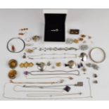 A collection of silver jewellery including bangles, chains, bracelet, two rings, earrings,