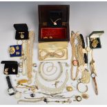 A collection of jewellery including silver brooch set with a cameo, two silver rings, yellow metal