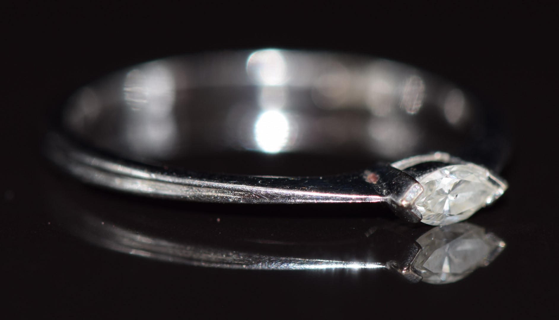 An 18ct white gold ring set with a marquise cut diamond, 1.4g, size L - Image 2 of 2