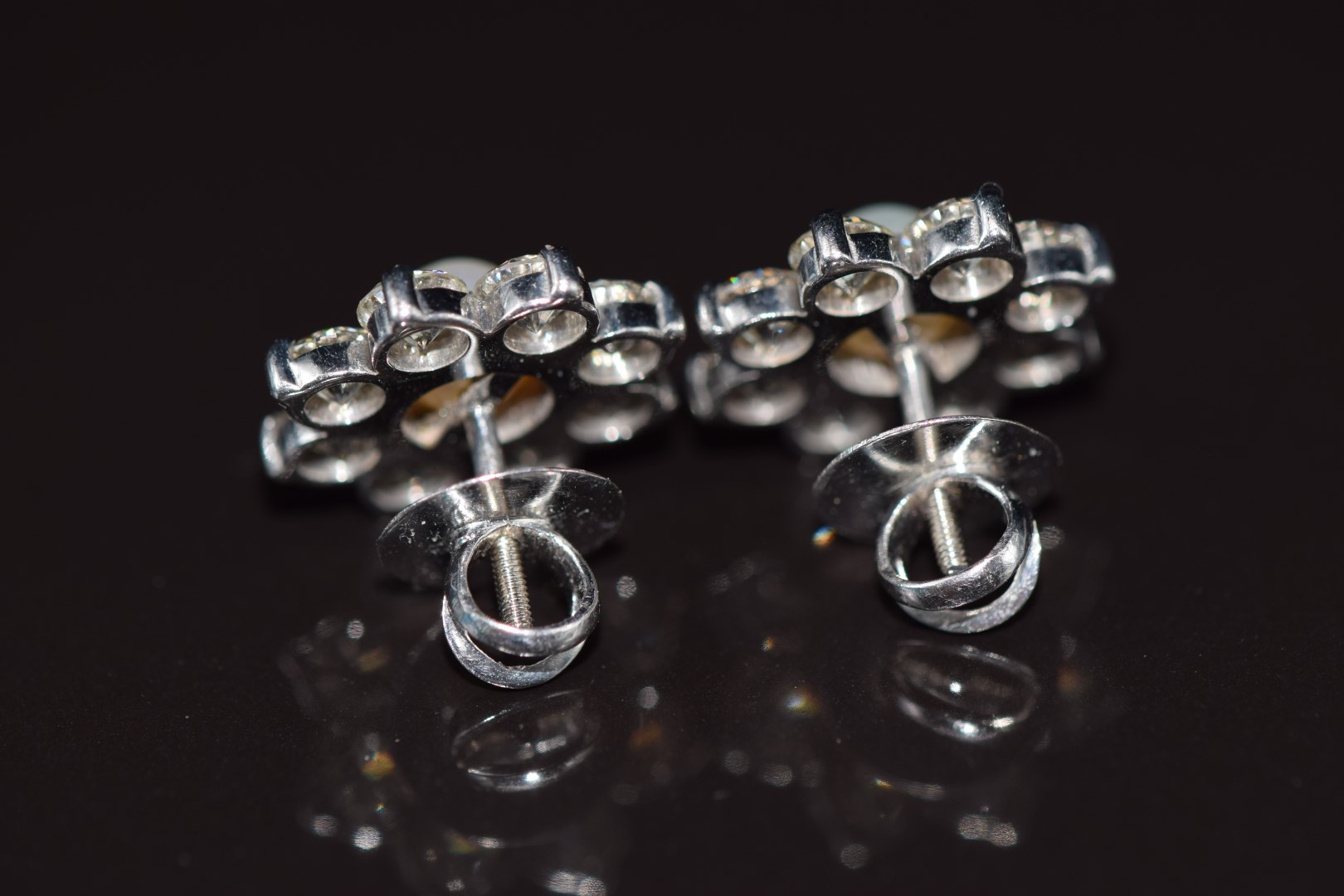 A pair of 18ct white gold earrings each set with a natural pearl measuring 5.3mm surrounded by eight - Image 3 of 3