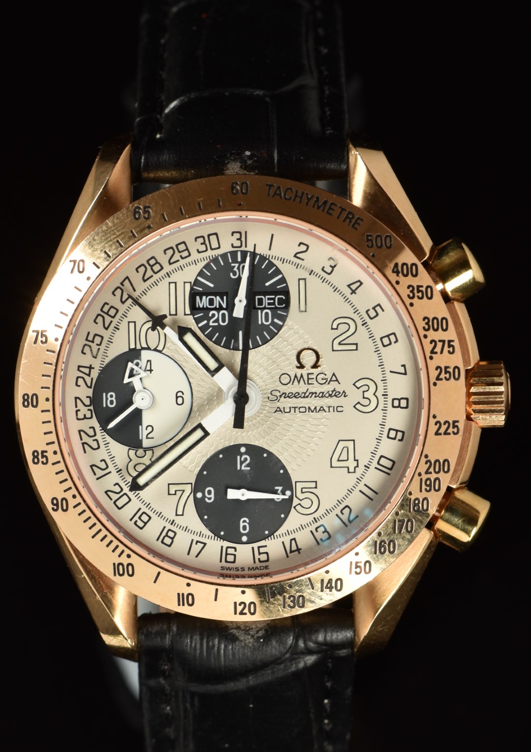 Omega Speedmaster Day-Date 18ct gold gentleman's automatic chronograph wristwatch ref. 3623.33.01