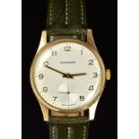 Garrard 9ct gold gentleman's wristwatch with subsidiary seconds dial, gold hands and Arabic