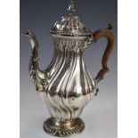 Edward VII hallmarked silver coffee pot with wrythen body in the Georgian style, London 1909,