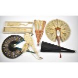 Collection of 19thC fans including carved bone with cut steel decoration, lace and an Italian inlaid