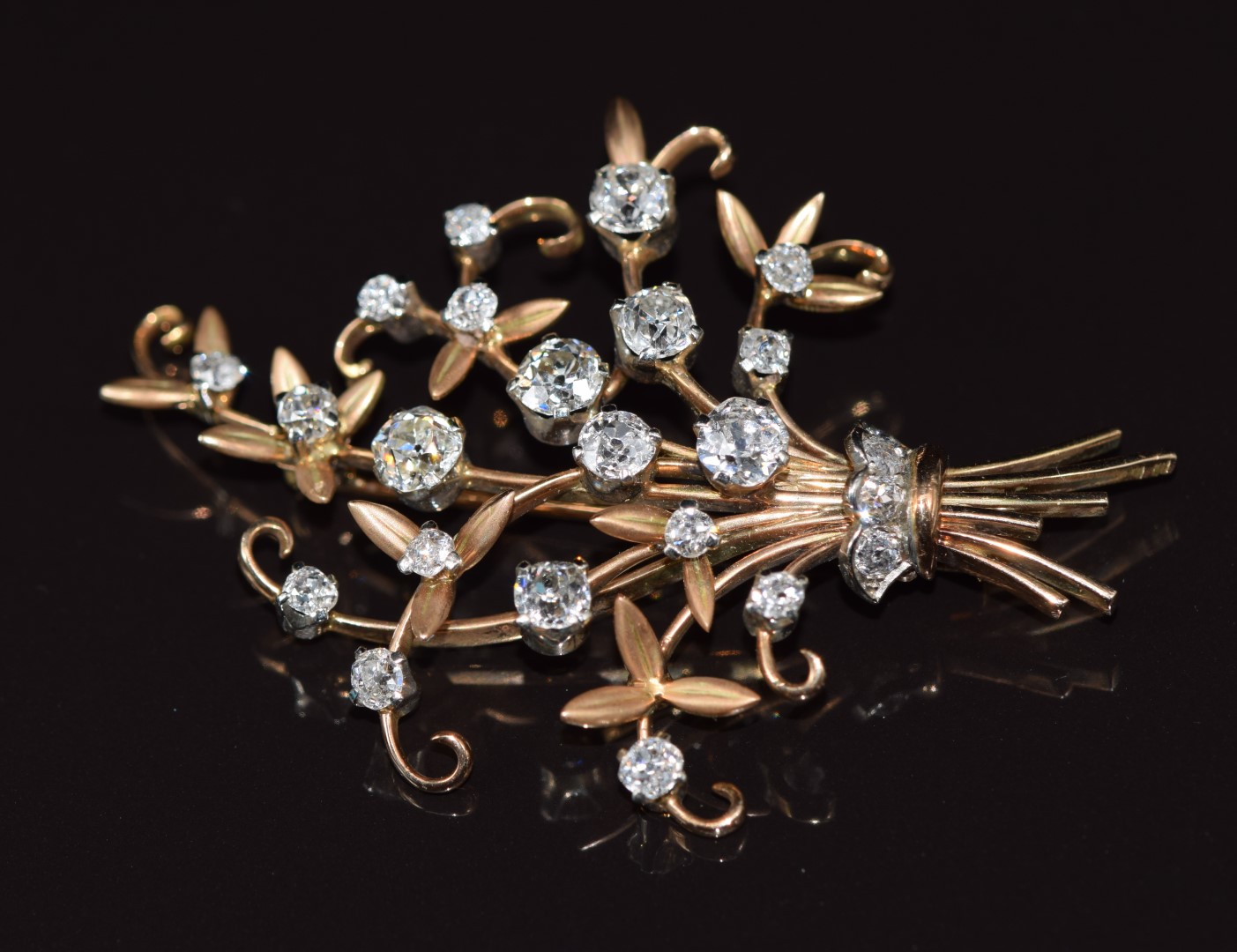 An 18ct gold brooch, c1910, in the form of a bouquet of flowers set with old cut diamonds, the - Image 2 of 4