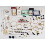 A collection of jewellery including silver gilt earrings, 9ct gold earring (0.4g), etc