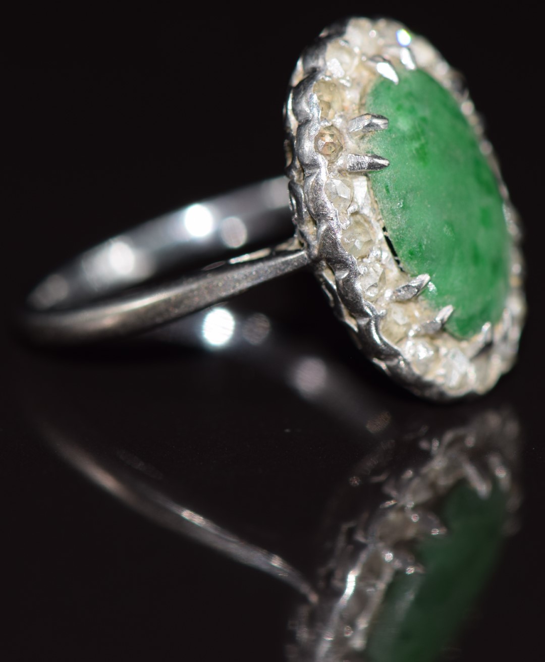 An 18ct white gold ring set with jade surrounded by rose cut diamonds, 2.6g, size F - Image 2 of 2