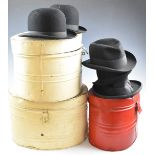 Three tin oval hat boxes, two bowler hats etc., largest diameter 43cm, H30cm