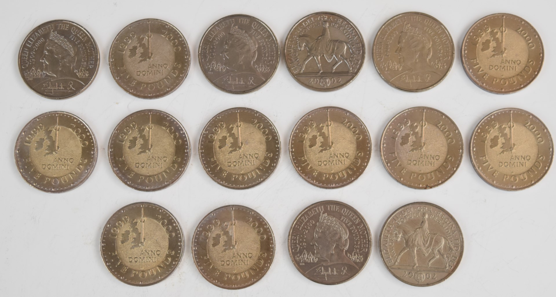 Sixteen Elizabeth II £5 crown coins comprising ten millennium coins, two 2002 and four 2000 Queen