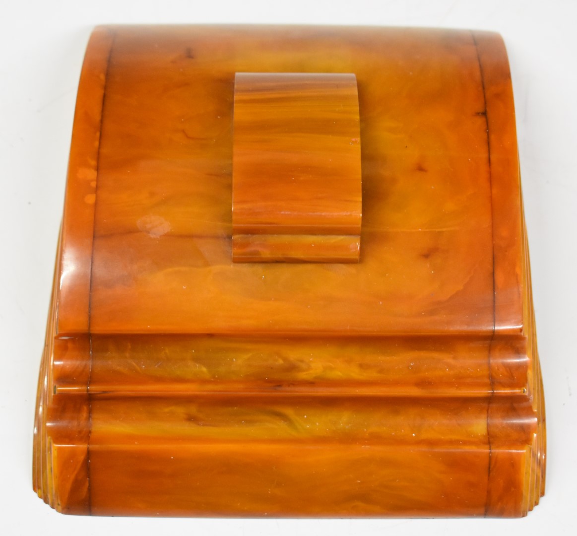 Cavacraft Art Deco Bakelite inkwell / standish with sliding cover in a faux amber effect finish,