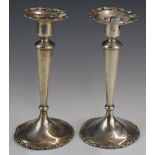 Pair of American silver candlesticks, marked to bases Shreve & Co. San Francisco sterling base