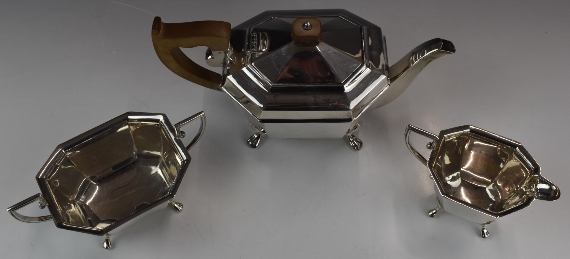 George VI Art Deco hallmarked silver three piece tea set of octagonal form, raised on four feet, - Image 2 of 4