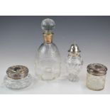 Hallmarked silver mounted glass items comprising decanter, sugar sifter and two dressing table pots,