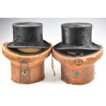 Two vintage top hats in leather cases, one Bissington, Leeds the other Lock & Co., both 19.5 x 15.