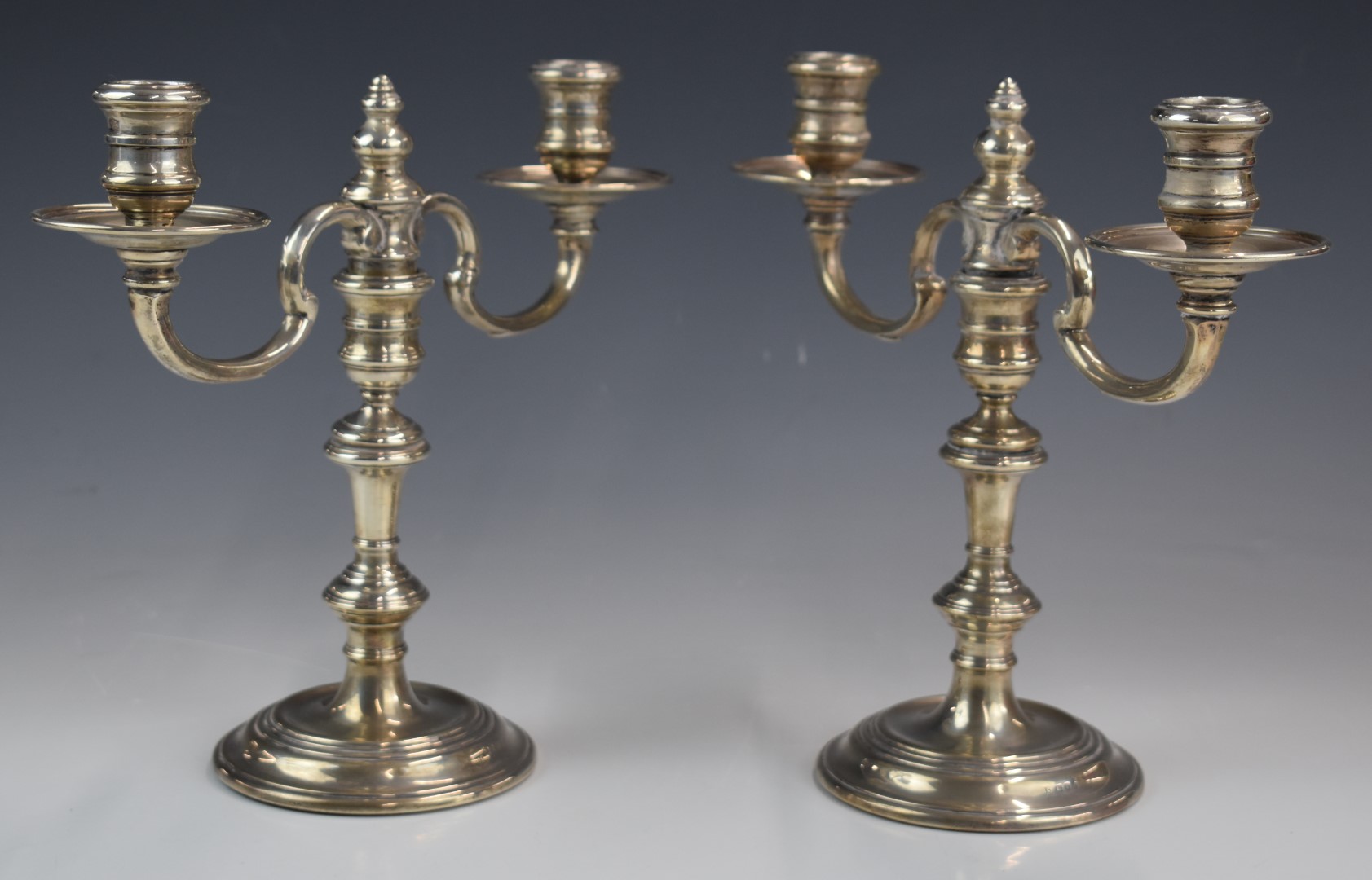 Pair of Elizabeth II hallmarked silver two branch candelabra, the tops being removable to form - Image 2 of 4