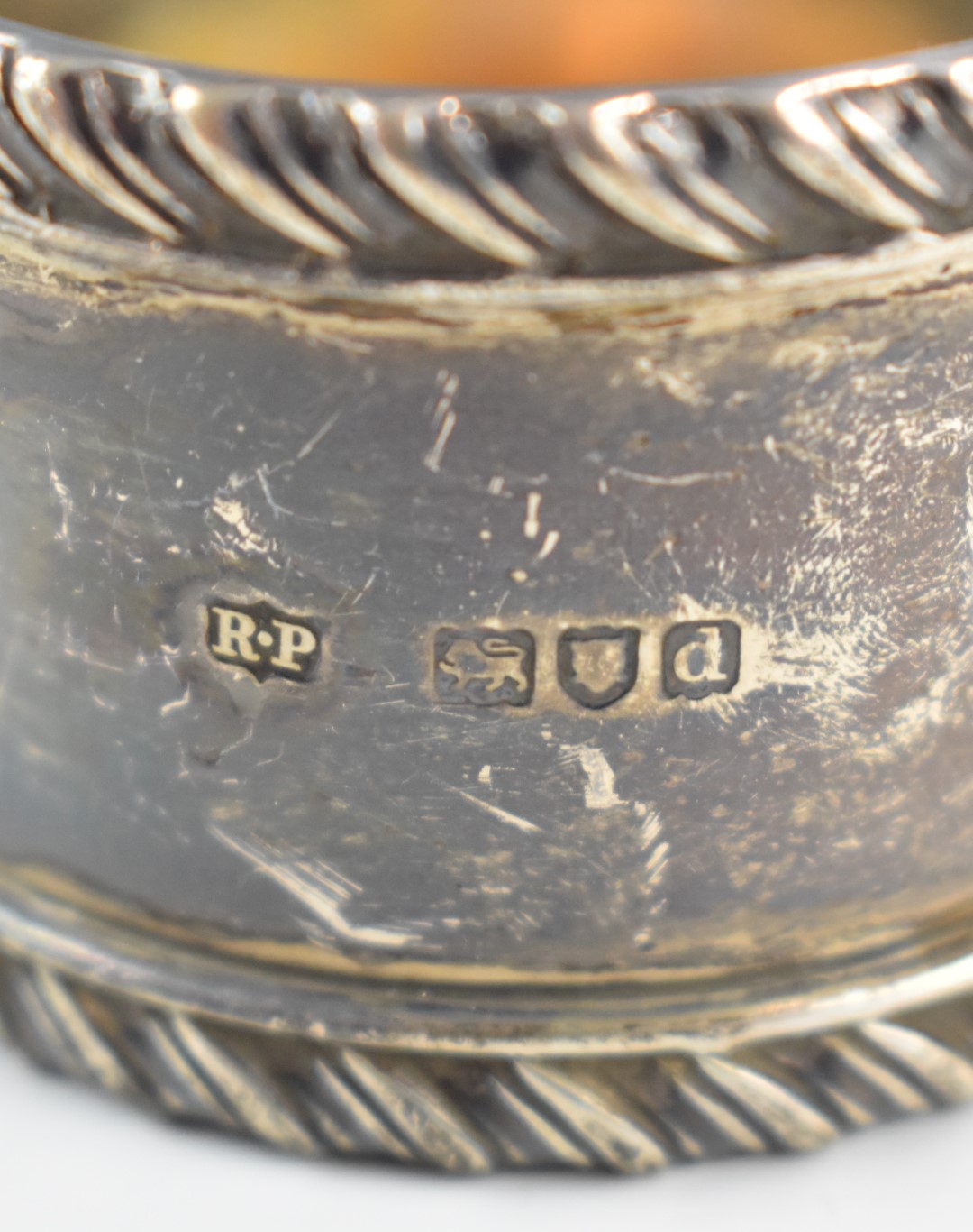 Hallmarked silver items comprising three various napkin rings, salt or mustard spoon and a cased set - Image 5 of 7